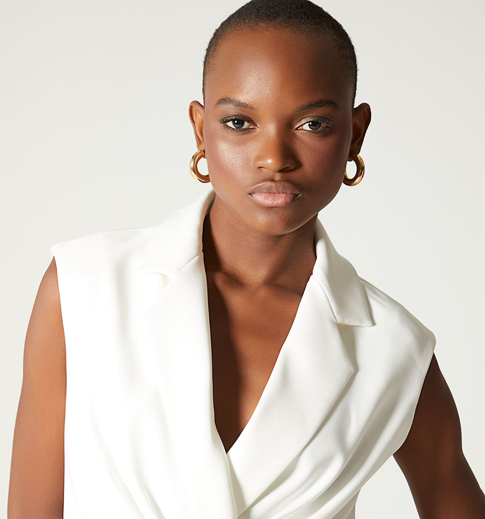 Chaleco frente cruzado con prenses