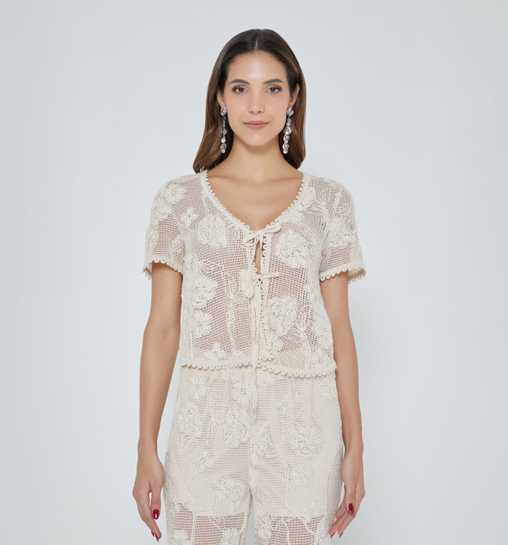 Blusa manga corta con canutillos